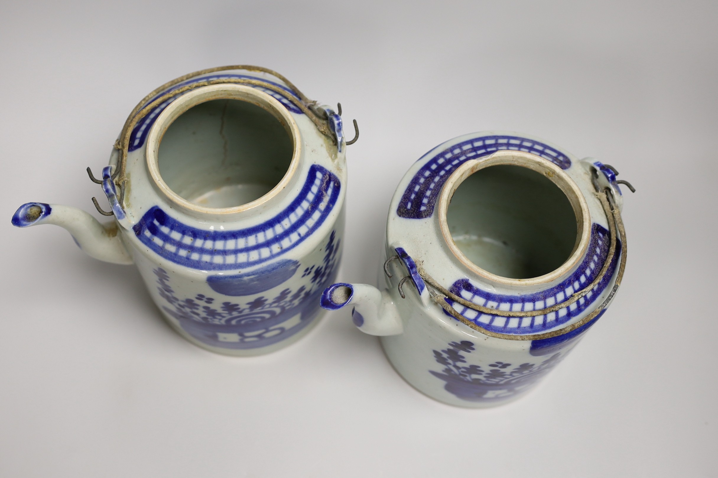 Two large Chinese blue and white teapots and covers, early 20th century, 19.5cm tall